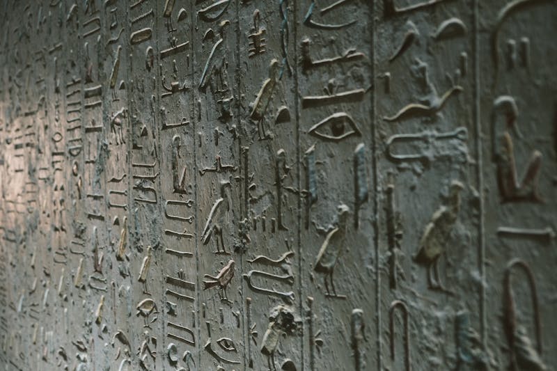 Summer desert heat with ancient pyramid silhouettes